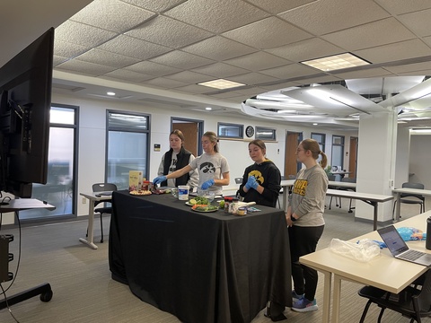 Students presenting a meal-prep on Zoom