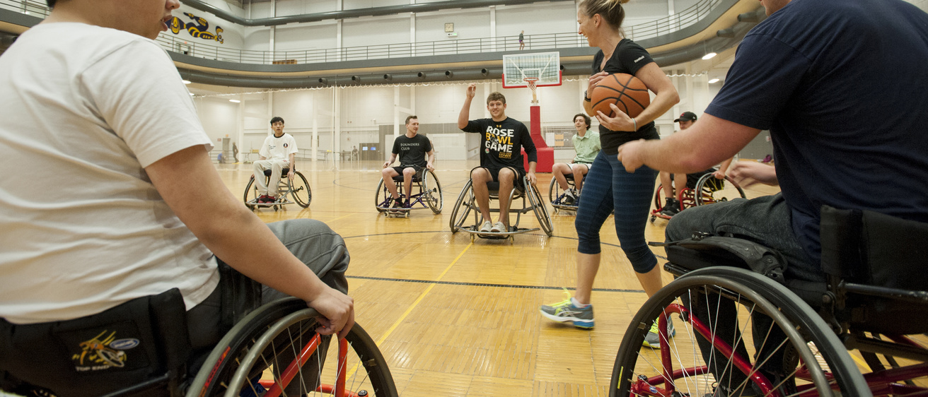 students at hoop fest in wheelchairs playing basketball